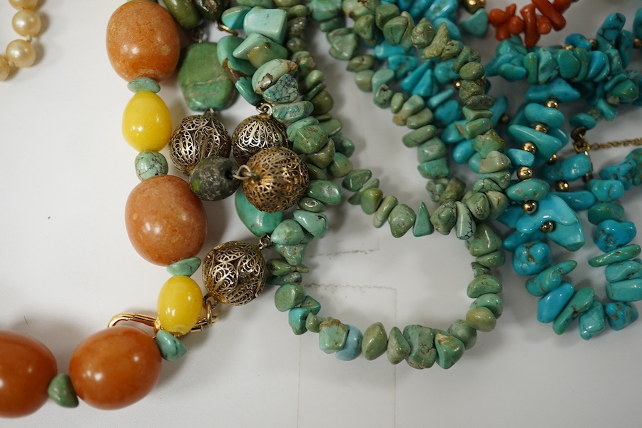 Seven assorted necklaces including turquoise and turquoise and coral longest approx. 80cm. Condition - poor to fair